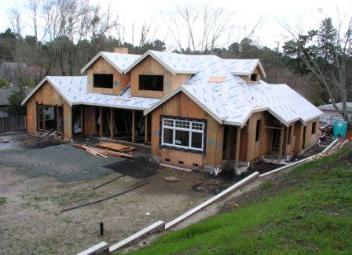 Wood-Framed Custom Residential Structure,Roof Trusses, Hill-side Retaining Wall